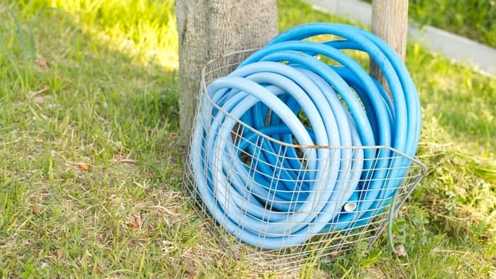 How do you store outdoor hoses?